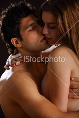 stock-photo-19093531-young-couple-holding-each-other-on-black-background
